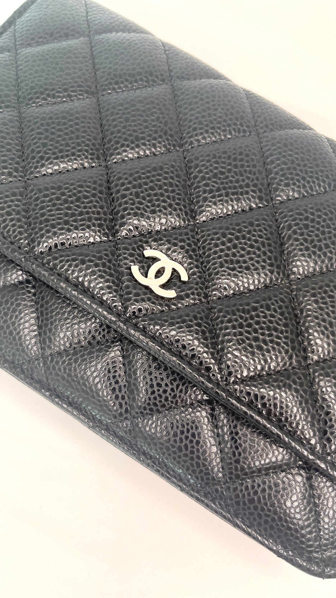 Chanel wallet on chain in black caviar grain leather and silver tone cc hardware