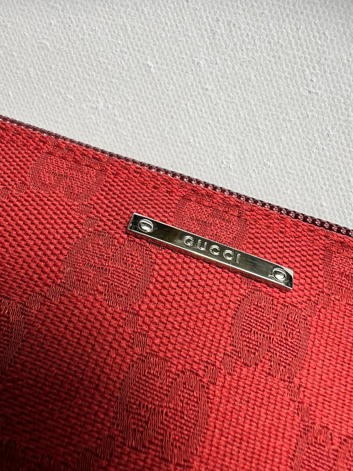 Gucci Monogram Small Pochette in red with top handle