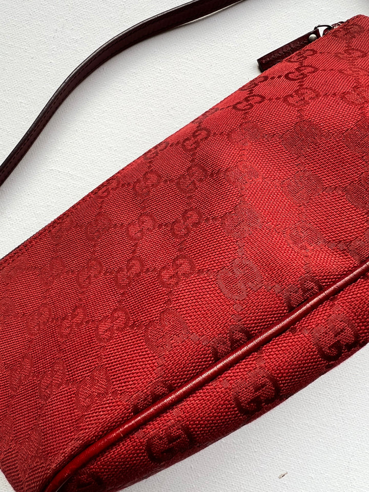 Gucci Monogram Small Pochette in red with top handle