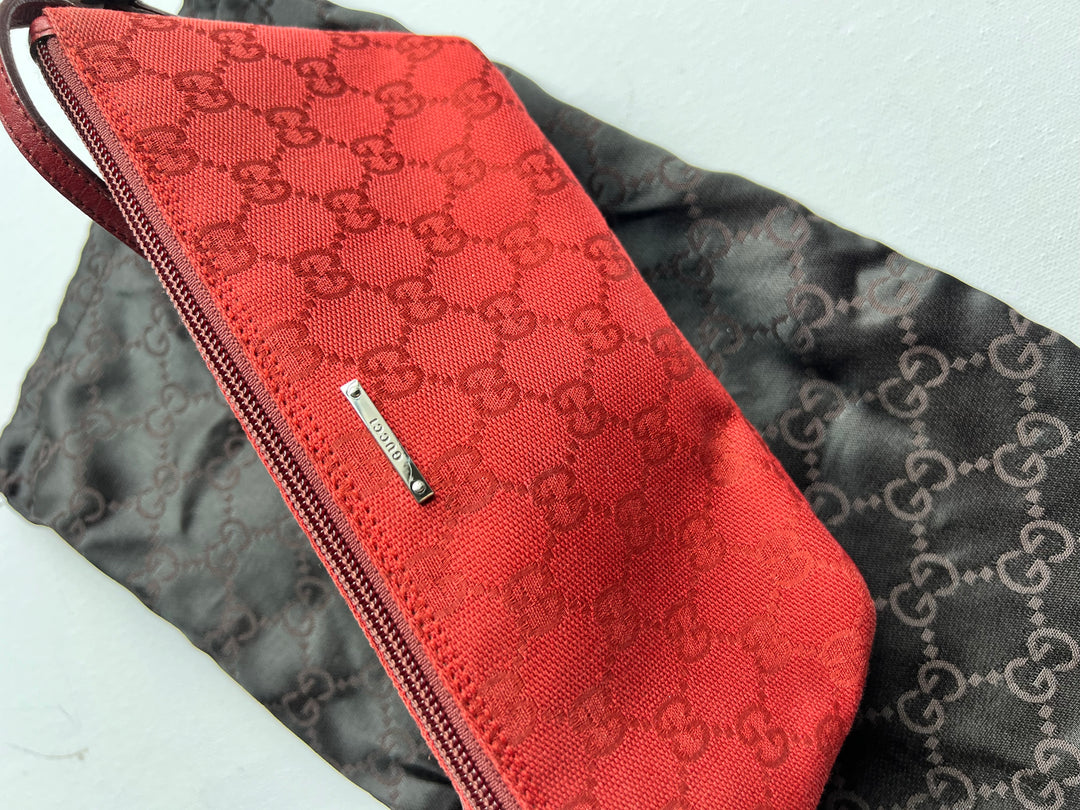 Gucci Monogram Small Pochette in red with top handle