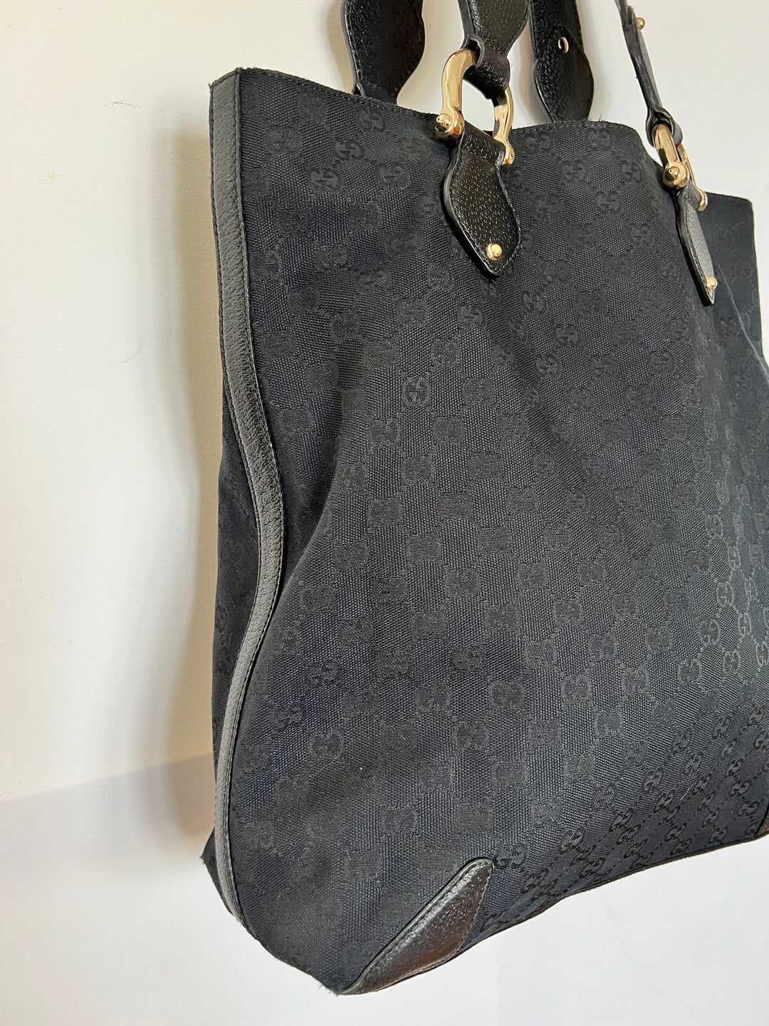 Black tote bag with GG design and black leather top handle