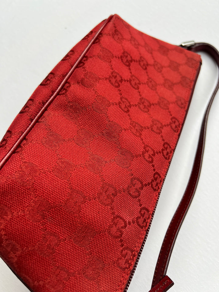 Gucci Monogram Small Pochette in red with top handle