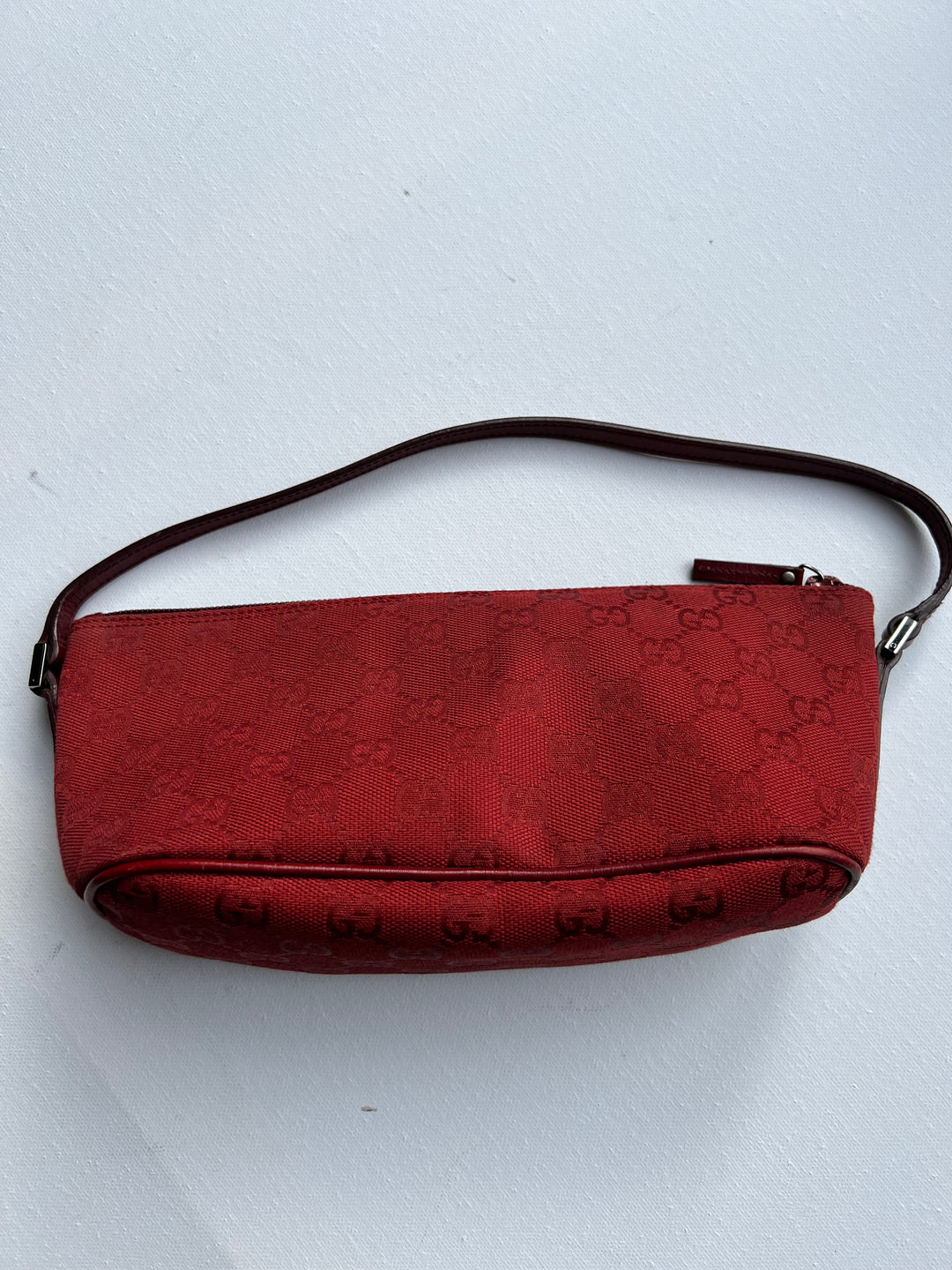 Gucci Monogram Small Pochette in red with top handle