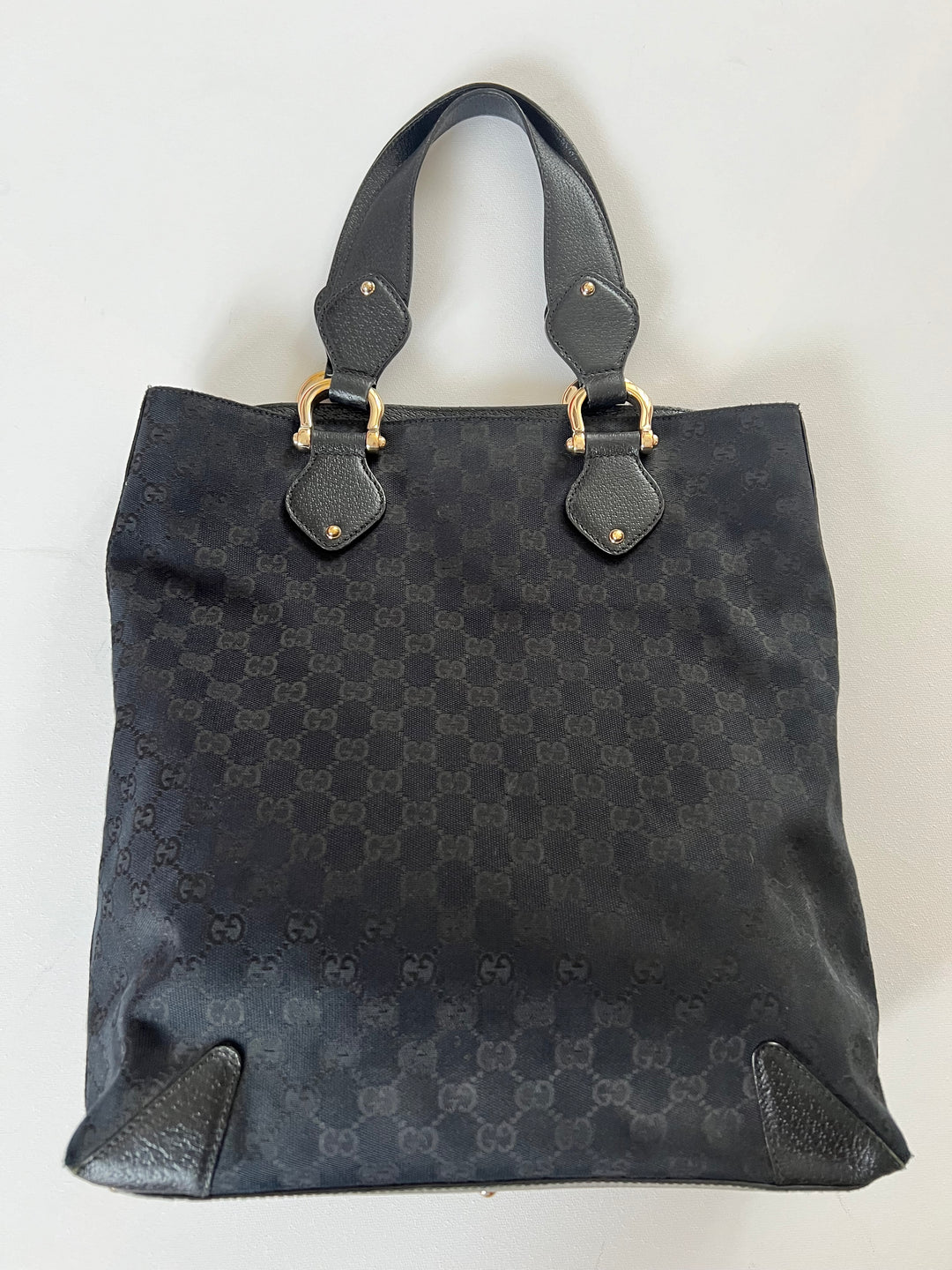 Black tote bag with GG design and black leather top handle