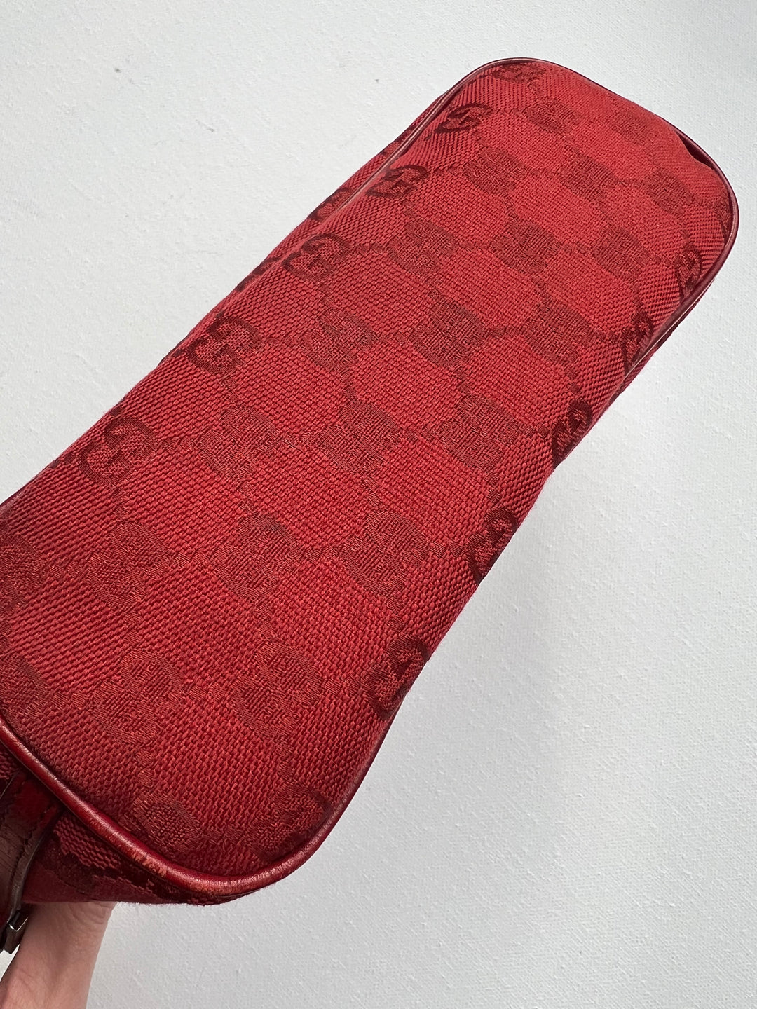 Gucci Monogram Small Pochette in red with top handle