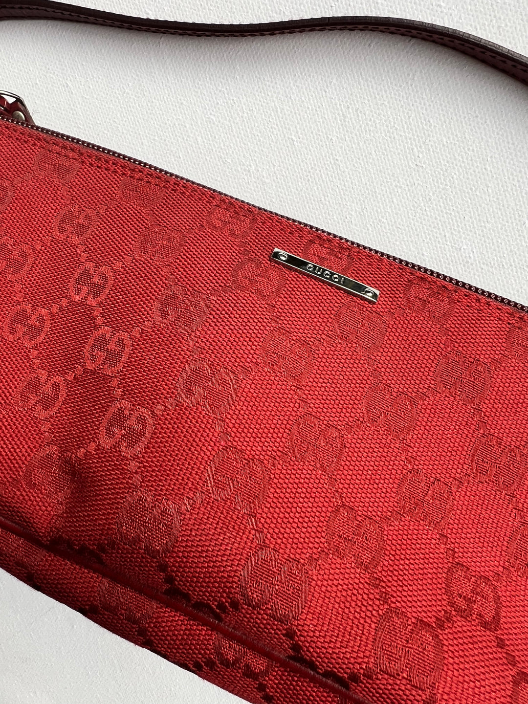 Gucci Monogram Small Pochette in red with top handle