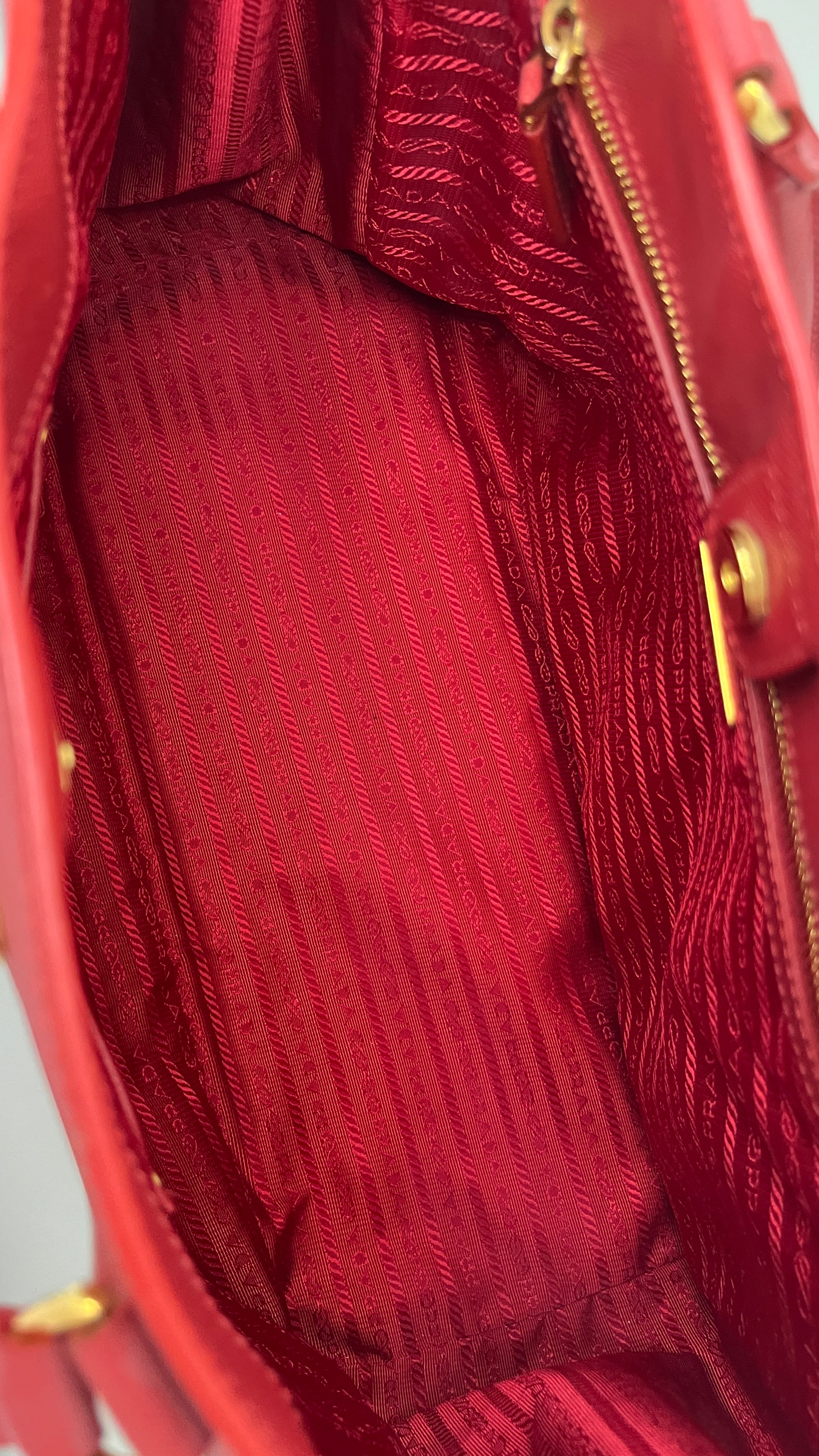 Prada bag with red inside best sale