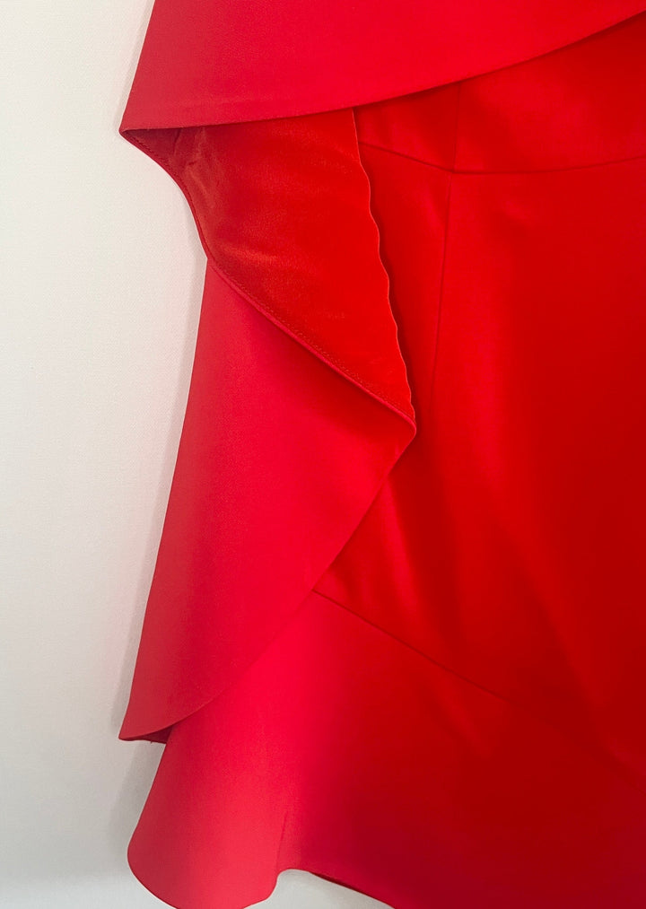 Drape detail on the red Pinko dress